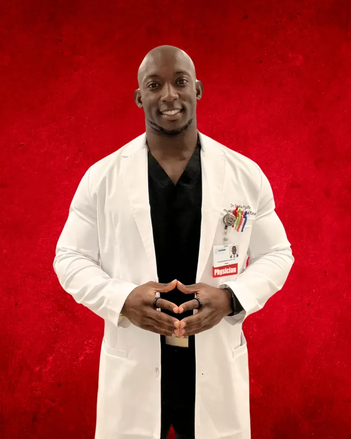 Dr. Emeka Ajufo in a white coat